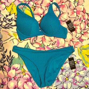 Brand new bikini in a super soft material and beautiful ocean blue color.
